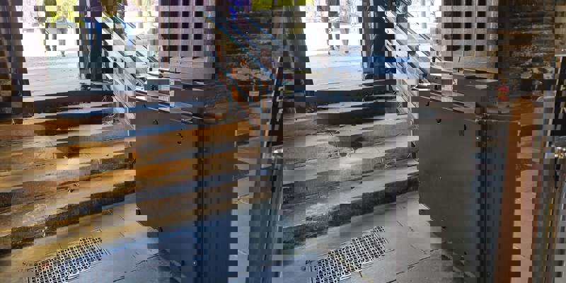 A platform lift at the entrance of Glasgow Cathedral, designed to provide access for wheelchair users.